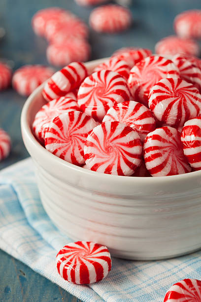 istock Sweet Red and White Peppermint Candy 525106077