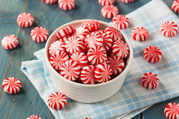 istock Sweet Red and White Peppermint Candy 525106101