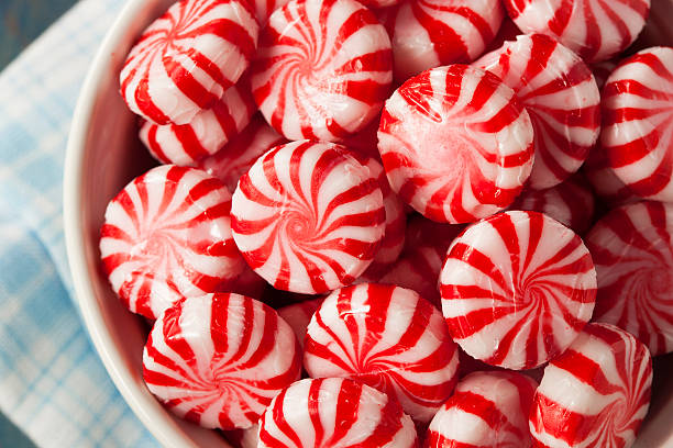 istock Sweet Red and White Peppermint Candy 525106711
