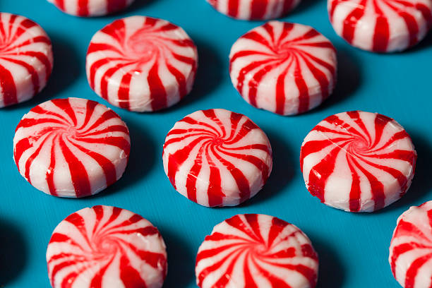 istock Sweet Red and White Peppermint Candy 525106861