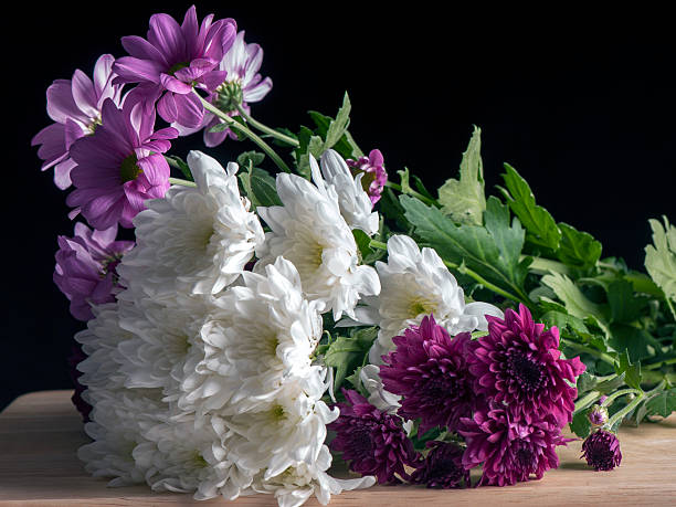 Flowers on a wooden board stock photo