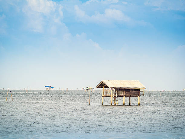 istock hut on the sea as home stay 525119571