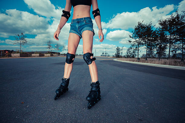 istock Young woman rollerblading on sunny day 525119643