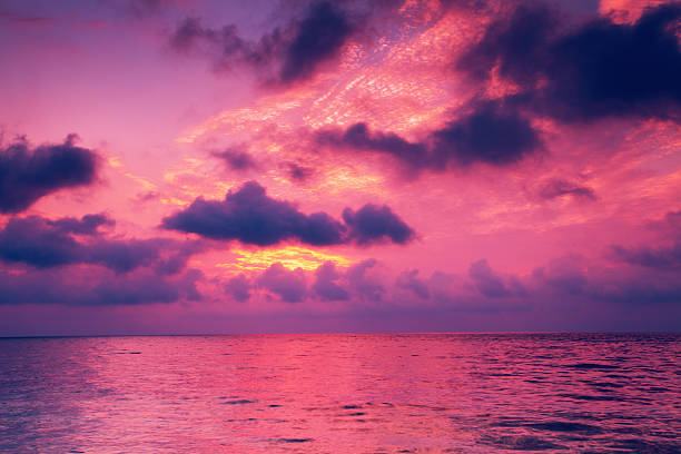 istock Beautiful pink sunrise over sea 525119667