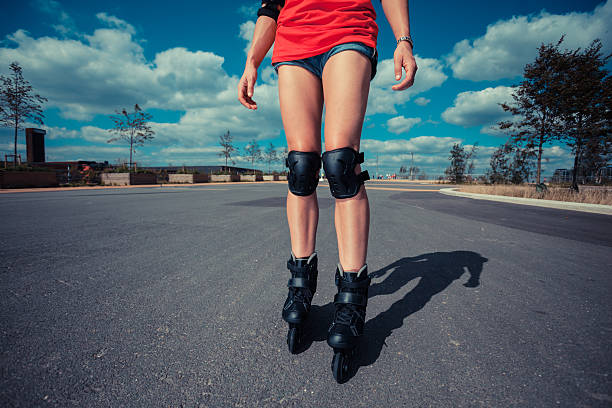 istock Young woman rollerblading on sunny day 525119891