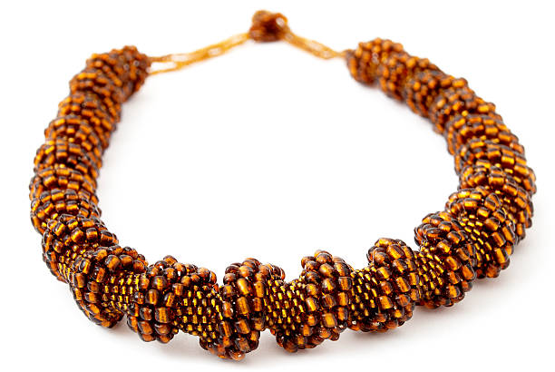 istock Brown Spiralling Beaded Neckwear, Traditionally African 525120011