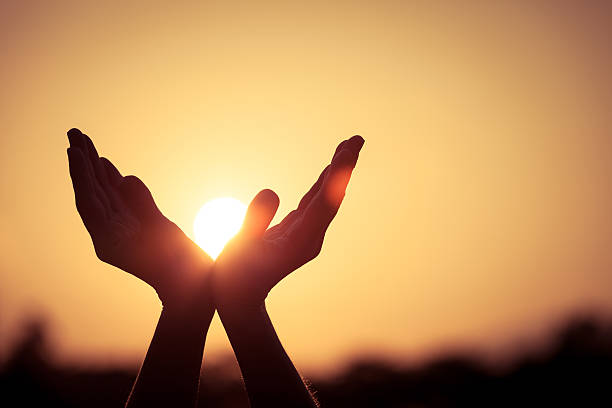 istock silhouette of female hands 525120067