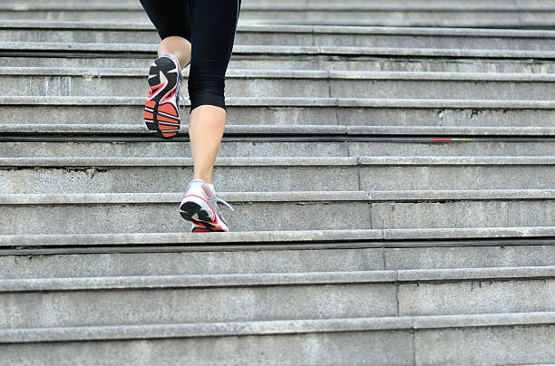 istock Runner athlete running on city stairs. 525124413