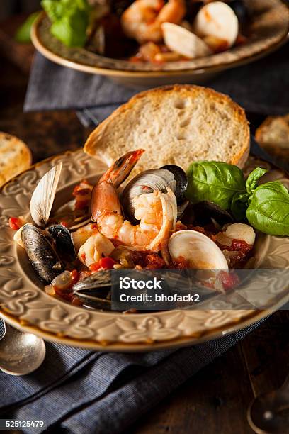 Homemade Italian Seafood Cioppino Stock Photo - Download Image Now - Bowl, Bread, Butter
