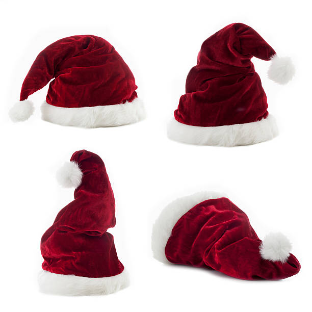 istock Four santa Claus hats on white background 525126837