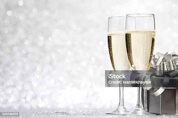 Champagne And Present Stock Photo - Download Image Now - Champagne, Christmas, Silver Colored