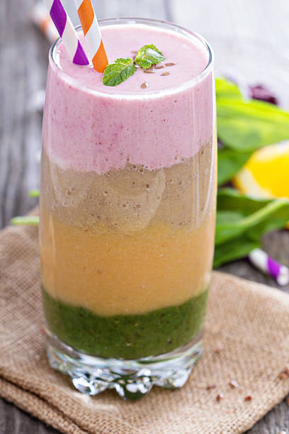 Rainbow smoothie with berries and fruits