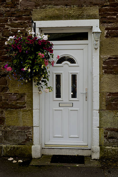 istock white door with flowers 525140001