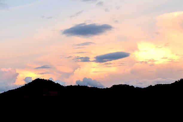 istock sunrise over silhouetted mountains 525141873