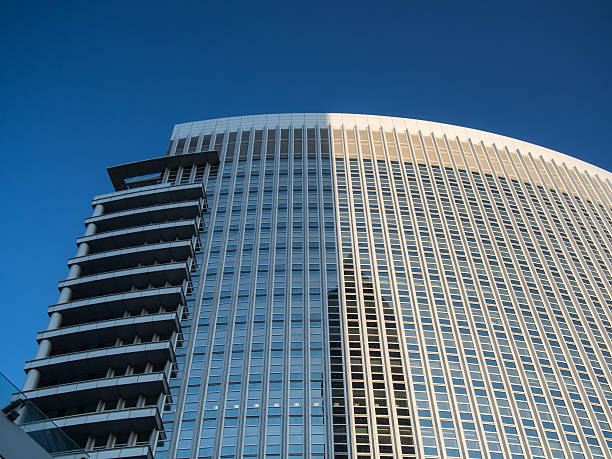 istock Dynamic skyscraper in the exhibition site in Frankfurt, Germany 525143995