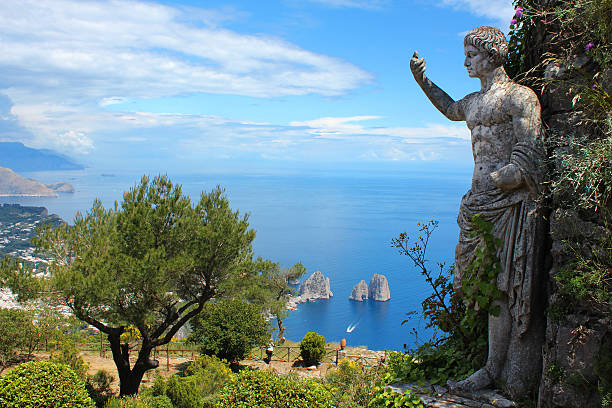 istock Statue on Monte Solaro, Capri, Italy with blue sea 525144245
