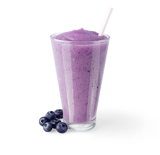 istock Blueberry Smoothie with Garnish on White Background 525144265