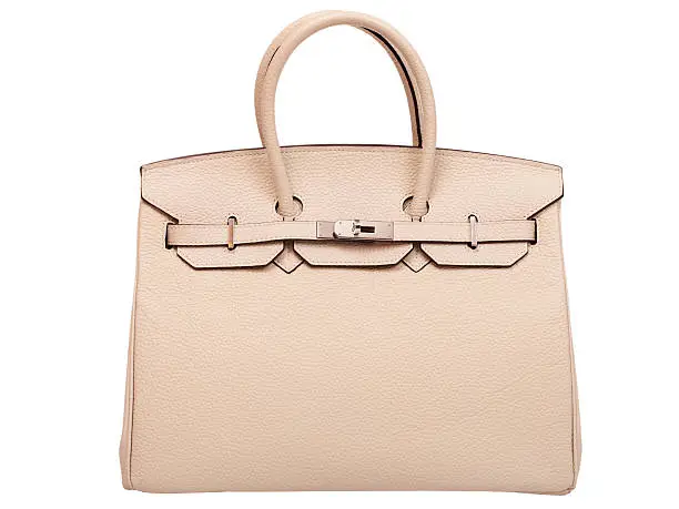 Leather female handbag, accessory on a white background nobody.