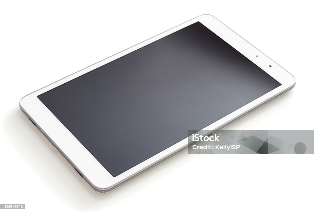 Digital tablet lying on a white table Digital tablet pc with the blank screen lying on a white table in perspective Digital Tablet Stock Photo