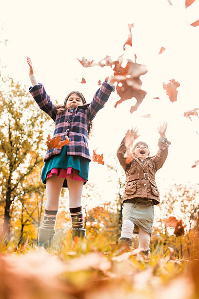 istock Playful girls in autumn. 525149647