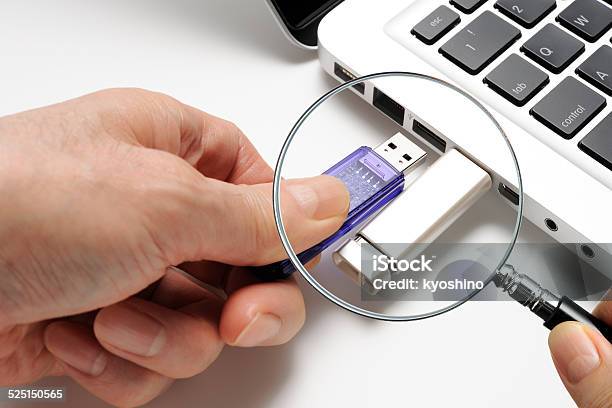 Looking For Privacy With Holding A Magnifying Glass Stock Photo - Download Image Now