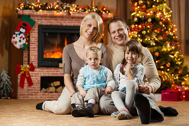istock Parents with their children on Christmas Eve. 525154807