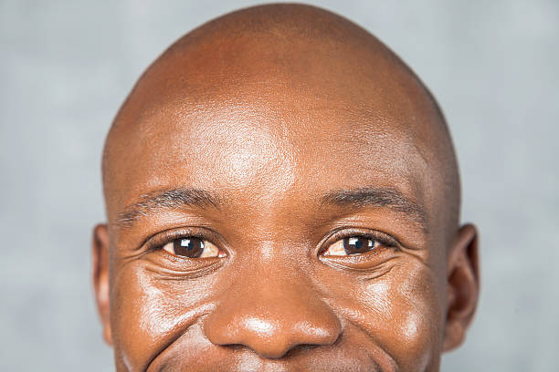 istock African male looking at the camera with a smile. 525155483