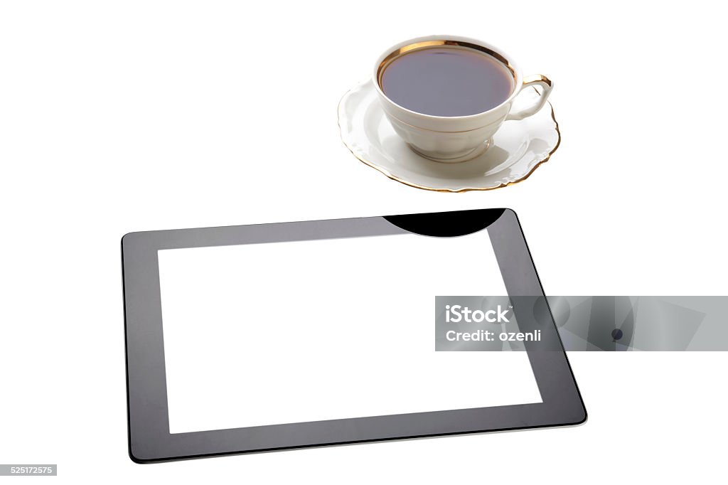 tablet pc with antique cup tablet pc displaying blank white screen. Isolated on white. Antique Stock Photo