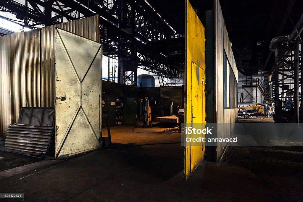 Abandoned industrial interior Abandoned industrial interior with door Abandoned Stock Photo