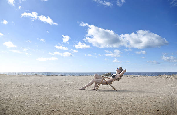 istock Girl relaxing at the seaside 525172903