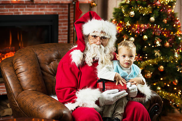 istock Santa Claus and little boy. 525174109