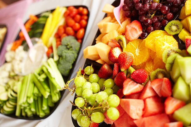 istock Fresh Fruit And Vegetable Salads Served At Birthday Party 525175961
