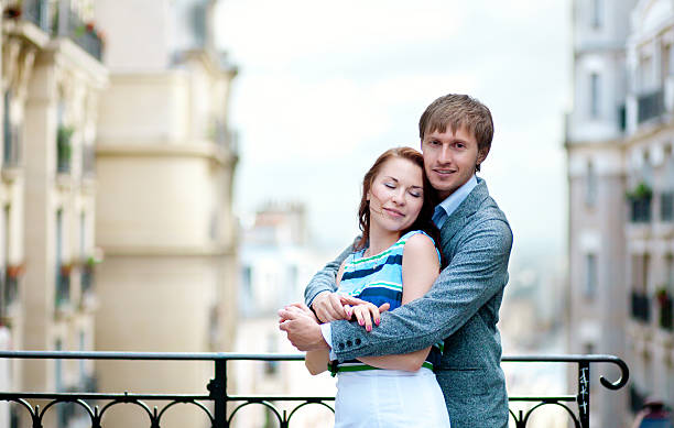 istock Beautiful couple hugging at viewpoint on Montmartre in Paris 525176927