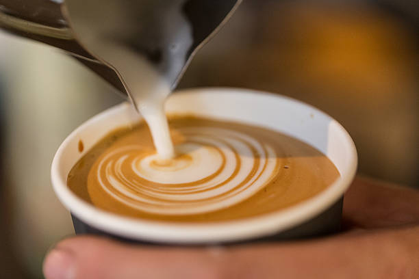 Cappuccino Making Latte art to go Close up of Cappuccino being made kaffe stock pictures, royalty-free photos & images