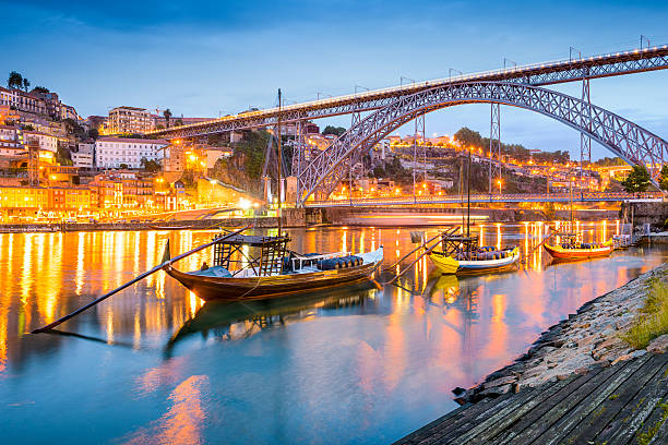 Porto, Portugal Cityscape Porto, Portugal cityscape on the Douro River. rabelo boat stock pictures, royalty-free photos & images