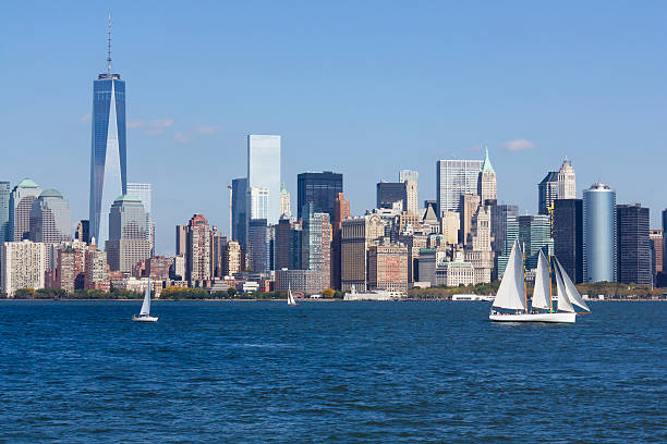 nyc skyline with sailboat stock photo