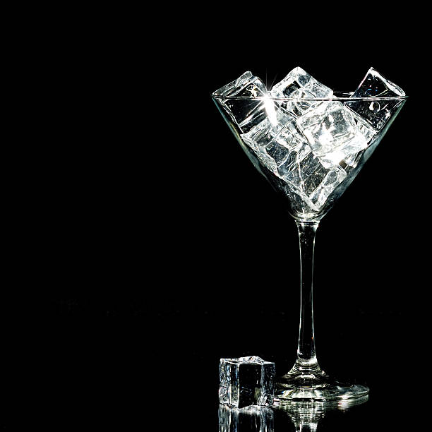 istock Cocktail Glass Filled with Ice cubes 525193123