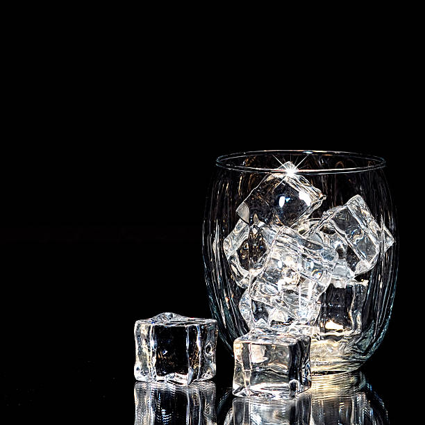 istock Glass Filled with Square Ice Cubes 525193137