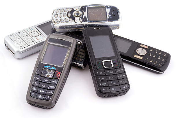 istock Bunch of old mobile phones isolated 525194247