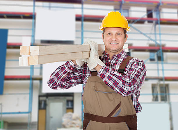 istock Repairman With Wooden Plank 525194301