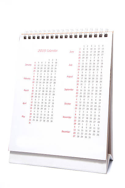 istock Desktop calendar 2015 isolated on a white background 525195273