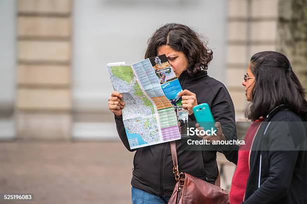 Women Tourists With City Map In Zurich Switzerland Stock Photo - Download Image Now