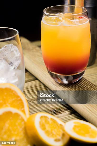 Tequila Sunrise Cocktail Preparations Stock Photo - Download Image Now - Alcohol - Drink, Bar - Drink Establishment, Brown
