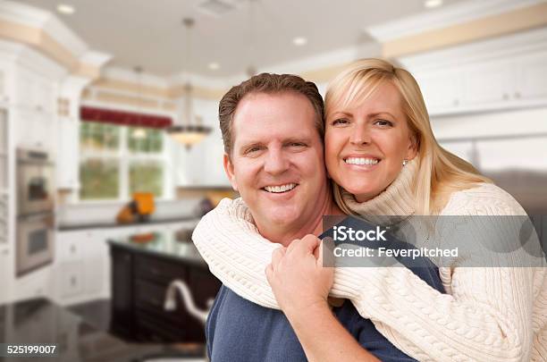 Happy Couple Inside Beautiful Custom Kitchen Stock Photo - Download Image Now - 30-39 Years, 40-49 Years, Adult