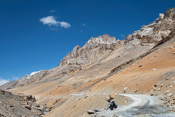 istock Motorcycle parked at the side of mountain road 525204821