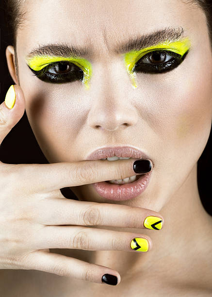 istock girl with art make-up, creative nail disign. 525204850