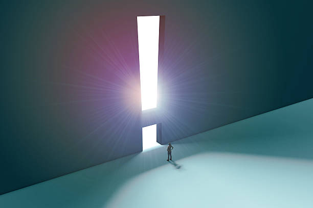 istock Figure in front of bright exclaimation mark 525206206