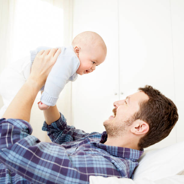 istock Father playing with baby boy 525208831