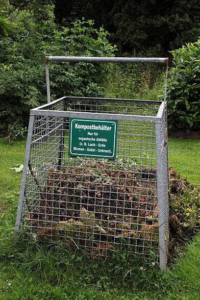 compost containers for cemetery waste - foto’s van aarde stockfoto's en -beelden