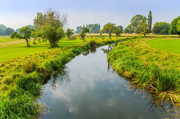 Free Stock Photo of A River Flowing Through Lush Green Countryside ...